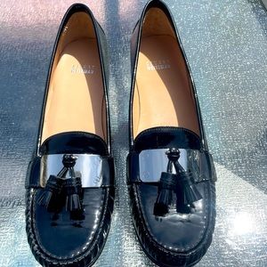 Stuart Weitzman Patent Leather Loafer with silver detail and tassels